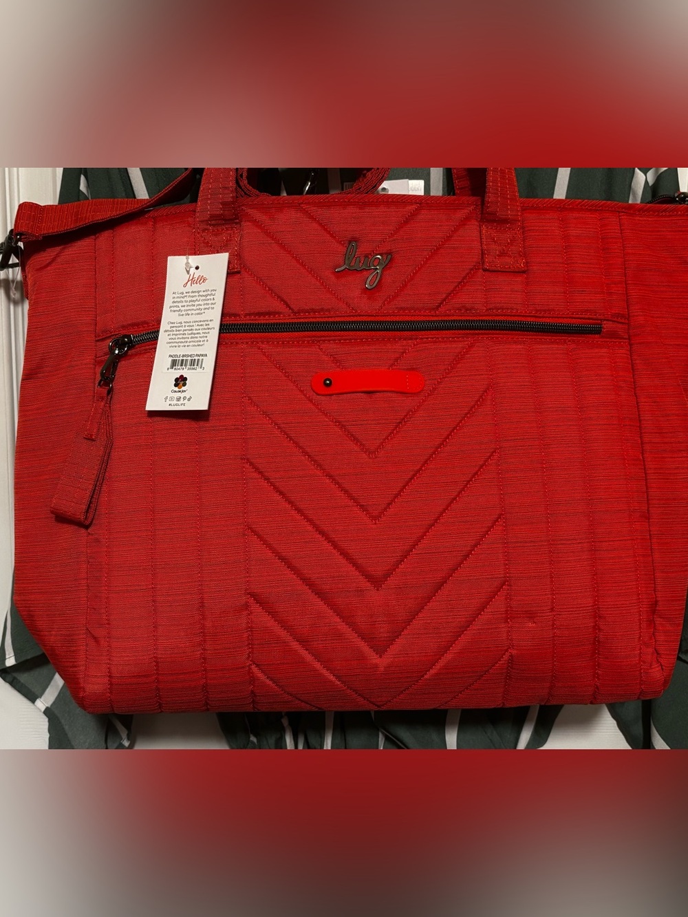 Lug NWT Paddle Carry All Tote Brushed Papaya with flaw on bottom